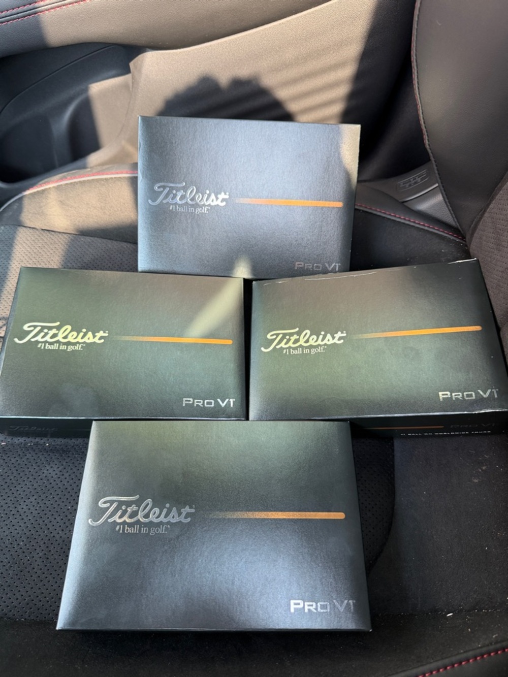 Titleist Pro V1 Boxes in Black with Orange Accent